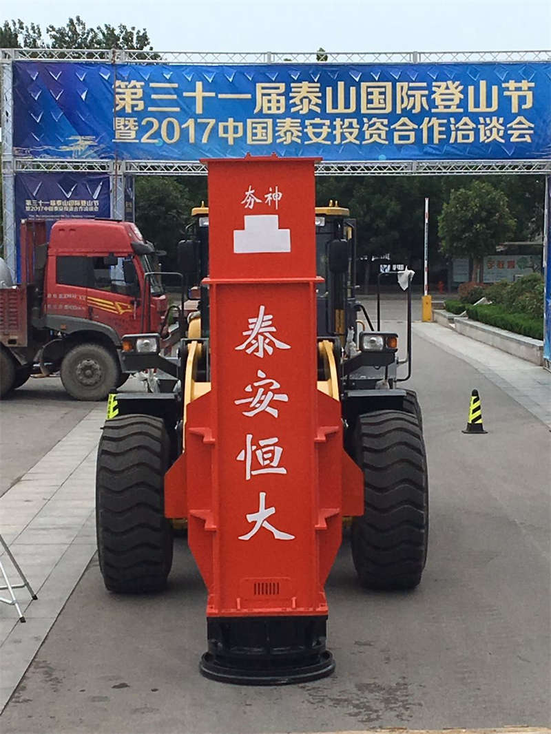 The Rapid Impact Compaction is installed on the loader for display The Rapid Impact Compaction is installed on the loader for display