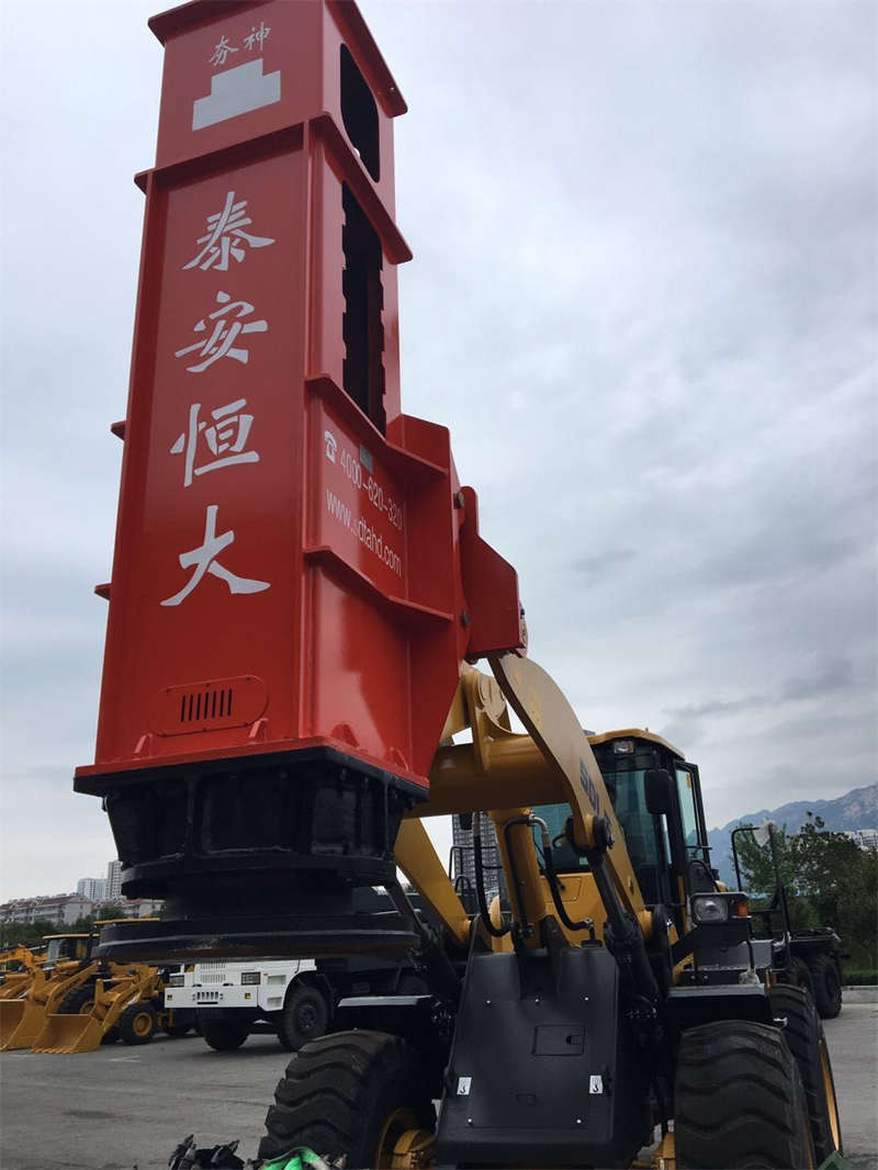 The Rapid Impact Compaction is lifted by the hydraulic drive of the loader The Rapid Impact Compaction is lifted by the hydraulic drive of the loader