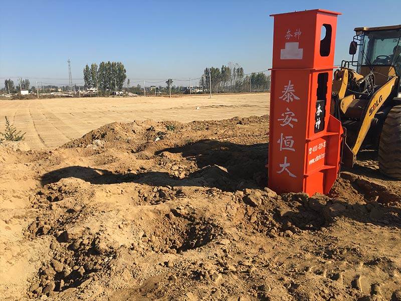 The hammer head is pressed into the soil under the rapid impact compaction